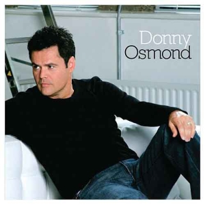 Donny Osmond - On Couch Magnet in the group MERCHANDISE at Bengans Skivbutik AB (5536634)